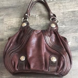 Brown purse with gold/silver details